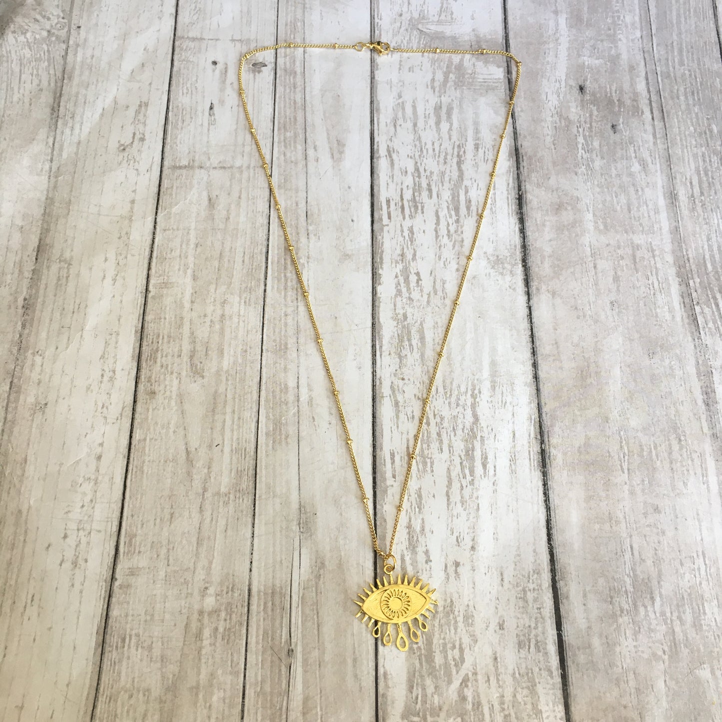 The Infinite Sadness in Gold Necklace